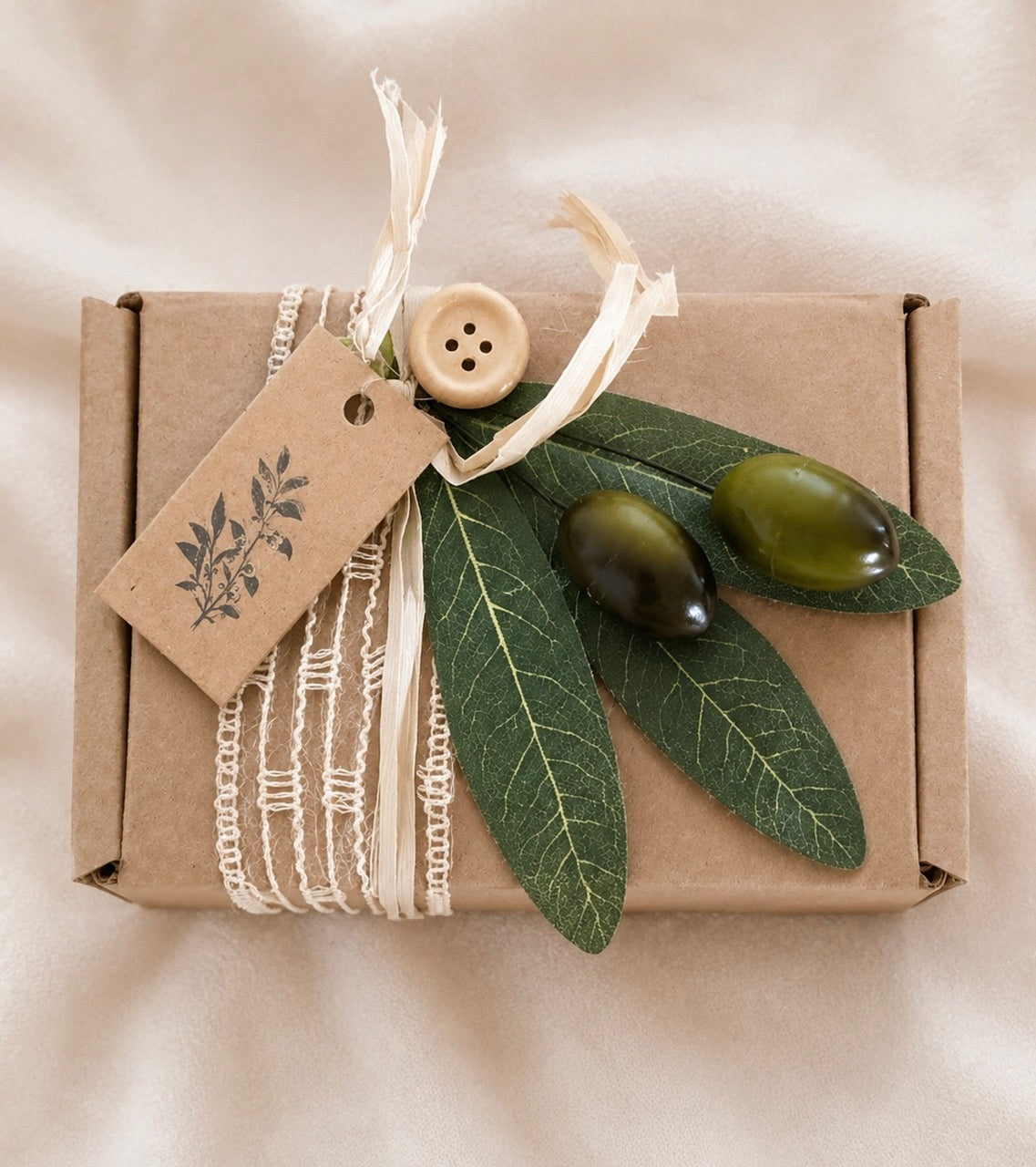 Seife in Geschenkverpackung mit Olive