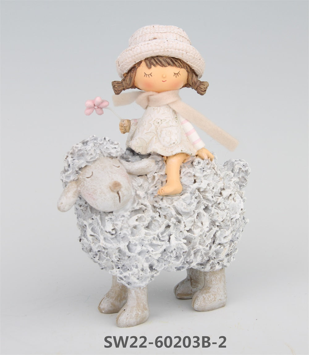 Figur Mädchen auf Schaf